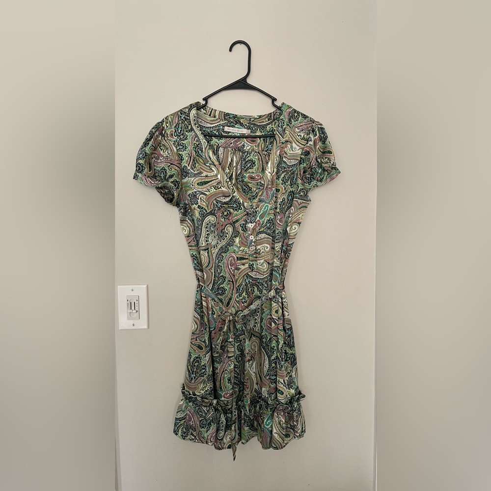 Beautiful green dress with design.